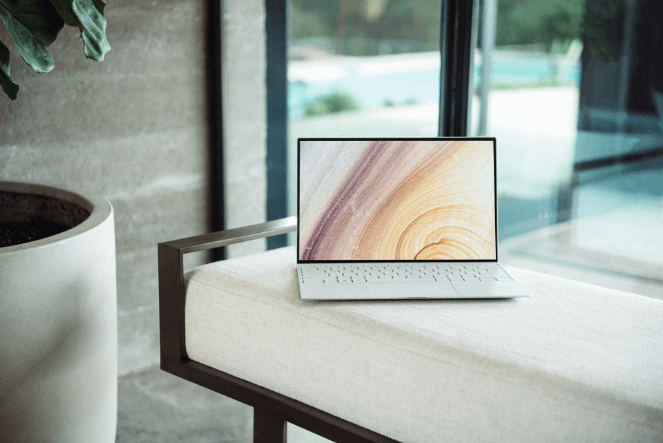 2.-stock_photo- - Blog Tyrant A stock photo of a laptop on a chair
